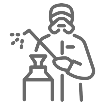 Worker spraying with protective gear icon.