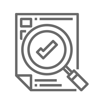 Magnifying glass over document with checkmark.